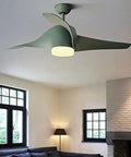 Rock Solid 52 Inch Retro Ceiling Fan With Remote And Bright Leds Dual Voltage Dc 110V 220V Super Slick Quiet Motor Elegant White Blades Perfect For Bedroom in a cozy room.