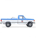 Side view of Ford F-250 XL 1991 Diecast Truck One Sixty Fourth Scale Chevron Emblems Blue Collar Series 14 Replica With Rubber Wheels