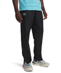 Model wearing Mens Woven Vital Workout Pants With Lightweight Ripstop Fabric For Durability And Comfort, Black, Regular Fit, Slim Leg.