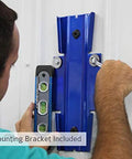 Installation of wall-mounted garage vacuum bracket with level tool, part of the Wall Mounted Garage Vacuum With 50 Ft Hose And Tools Heavy Duty 7 Gallon Steel