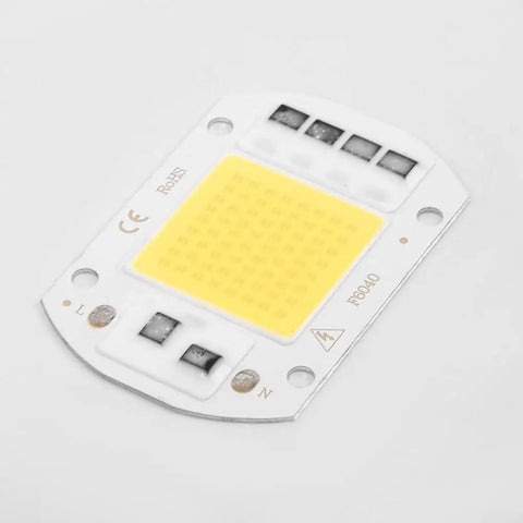 LED COB Chip Floodlight Bulb 20W 30W 50W 220V Input High COB chip lighting component with yellow surface on a white background.