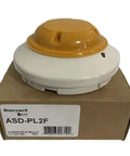 Tough As Nails Intelligent Addressable Smoke Detector For Commercial Fire Alarm Systems on a cardboard box, showcasing its design.