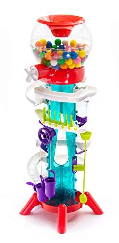 Thames and Kosmos Gumball Machine Maker toy, front view: clear plastic gumball machine on a red base with multicolor balls.