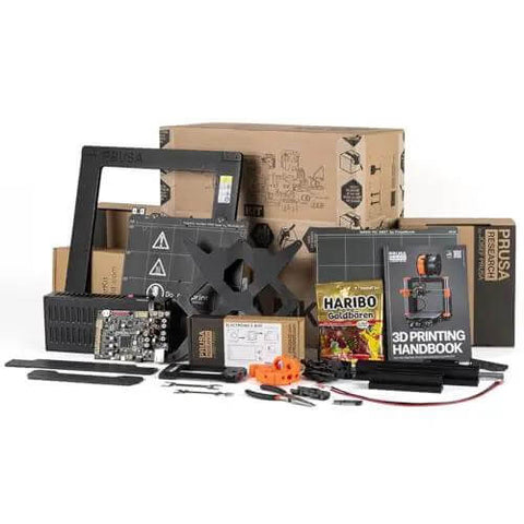 MK4S 3D Printer Kit With Automatic Calibration And Removable Sheets, parts and handbook displayed, DIY setup components.