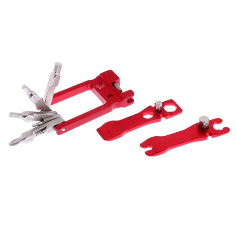 Compact Bike Repair Tool Kit with Multiple Functions, sturdy steel, showing red multi-tool and wrenches for emergency bike maintenance.