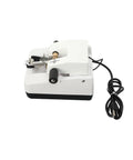 Tough As Nails Automatic Optical Lens Groover And Beveling Machine for eyeglasses, featuring ergonomic design and electrical cord.