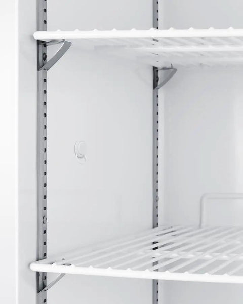 Interior view of Commercial Upright Freezer 18 Cu Ft Left Handed Door Swing with white shelves and sturdy metal support brackets.