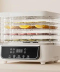 Straight Up Electric Food Freeze Dryer Machine With Five Trays and Digital Timer displaying fruits on five removable trays.