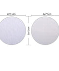 Two round adhesive pads from Ten Pairs Anti Curling Carpet Tape Keeps Rugs In Place Non Slip Adhesive For Carpets Sofas And Sheets