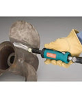 Person using Badass.5 Hp Straight Line Die Grinder Pumping 24000 Rpm on metal propeller for polishing.