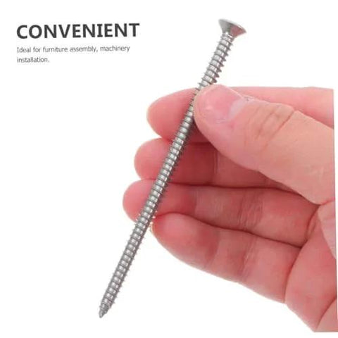 Hand holding a Stainless Steel Countersunk Flat Head Self Tapping Screw For Furniture Assembly Tough As Nails Durable.