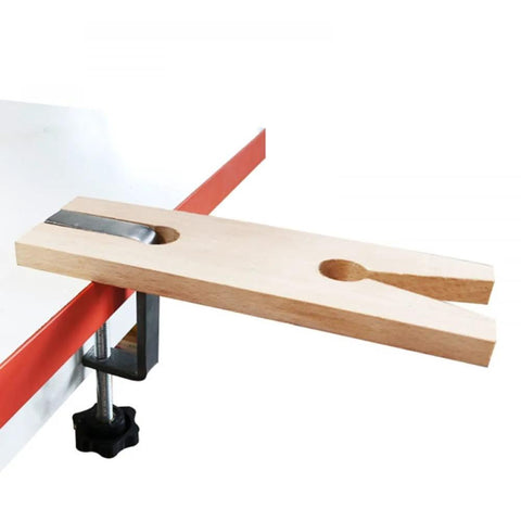 Wooden pin clamp from Adjustable Jeweler's Saw Frame Kit With 144 Blades Pro Grade 3 In 1 Jewelry Making Set clamped to table