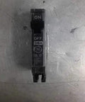 Top Shelf Three Pole Thermal Magnetic Circuit Breaker Rated At One Hundred Amps And Two Forty Vac With Terminal Lugs And Twenty Two Thousand Amp Fault Current For Serious House Repairs And Heavy Duty Wiring viewed from the top, showing ON/OFF switch.