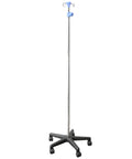 Heavy Duty Stainless Steel Rolling IV Pole Stand With Built Tough Four Prong Holders And Quick Glide Casters For No Fuss Room To Room Movement Plus Straightforward Height Adjustments in a clinic setting.