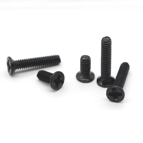 18 Piece Miniature Machine Screw Set With Countersunk And Round Head Screws In Clear Organizer Case For Laptop Repair Glasses And Watch Maintenance Everyday Precision Hardware Kit showing five black screws displayed on a white background.