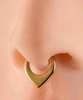 Thick V Shaped Hinged Segment Clicker Ring in 16G 316L Stainless Steel Gold Tone Durable Piercing Jewelry For A Bold Killer Look Choose 8mm Or 10mm Diameter shown in nose piercing view