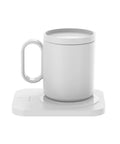 Smooth Ride Electric Mug Warmer With Extra Thick Silicone Pad For Coffee And Tea Fast Heat Coaster white ceramic mug on a coaster