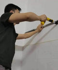Person using Mini Manual Steel Nail Gun For Wall Fastening And Riveting, One Hand Operation, Compact Durable Metal Gun