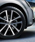 Close-up of Volkswagen wheel with Center Cap For Volkswagen Wheels 3B7-601-171-XRW OEM Replacement Hub Cap Direct Fit Authentic VW Style