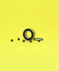 Smooth Hybrid Ceramic Bearings For Your Motor Spindle, Featuring Ultra Low Friction Abec 1 Grade Si3N4 Balls In 8 * 16 * 5 Size on yellow background.