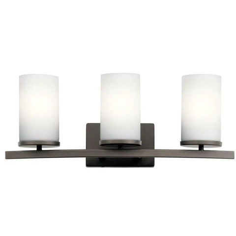 Crosby 23-Inch 3-Light Vanity Light In Satin Etched Cased Opal Glass With Olde Bronze Finish for bathrooms or powder rooms.