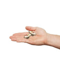 Person holding two Ceramic Cabinet Handles Antique Brass Pulls Vintage Drawer Knobs For Kitchen Cupboard Bar Pastoral European Style Flower Door Hardware