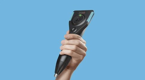 At Home Shockwave Therapy Device For Men To Bust Erectile Dysfunction And Kickstart Penile Blood Flow Naturally For Smooth Performance And Unshakable Confidence Every Day held in hand with digital interface.