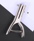 Tough As Nails Single Hole Punch For Crafts And Scrapbooks, Quarter Inch Hole Puncher in zinc alloy punching white paper.