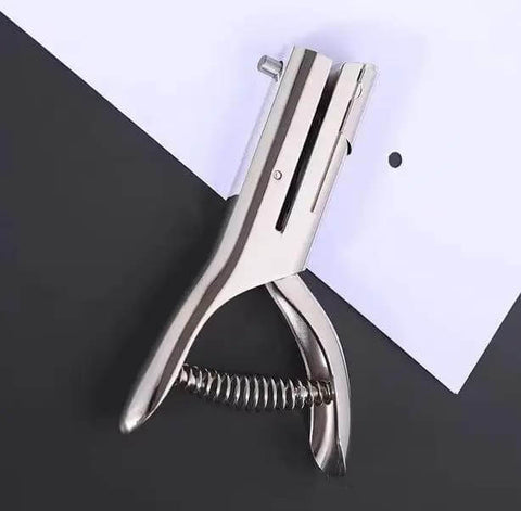 Tough As Nails Single Hole Punch For Crafts And Scrapbooks, Quarter Inch Hole Puncher in zinc alloy punching white paper.