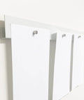 White Magnetic Wall Display Bars For Kid Art And Photos Strong Magnet Gallery Track System Total Flex Spacing Setup showing three papers held on a steel rail.