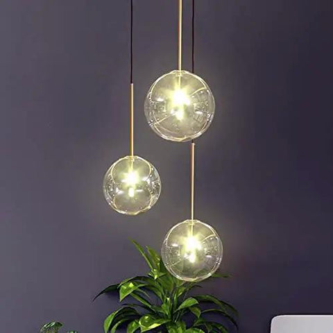 Modern Six Head Glass Pendant Ceiling Light With Warm White Bubble Shades And Brushed Chrome Frame, featuring three bubble shades.