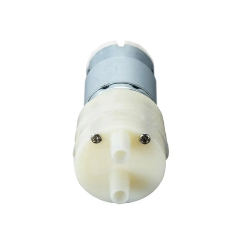 Get this sleek 1.45L Per Minute 12V Automatic Electric Diaphragm Water Pressure Pump For Your Home Or Shop! Super Quiet And Durable Design Makes It Perfect For Aquaria, Irrigation Systems, And Fluid Transfer Jobs No Hassle Easy Install And Reliable - Close-up of pump component showing connection points.