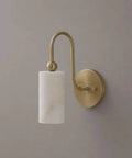 Modern Alabaster Wall Sconce - Natural Marble Wall Lamp with Luxury Brass Finish mounted on wall with elegant design.