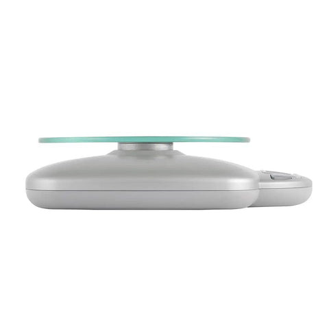 Side view of Digital Glass Top Kitchen Scale with 11 lb capacity and LCD display, sleek silver finish, for precise meal prep.