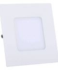 Square white wall light fixture with recessed panel
