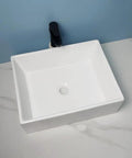 USZWBY Vessel Sinks Modern Minimalist Home Balcony Ceramic Wash Basin Bathroom Square Flat Bottom Countertop Bathroom Bowl Sink top view on marble surface.