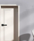 Bulletproof Zinc Alloy Smart Door Lock With Zero Hassle Fingerprint Access And Integral Emergency Power Port For Knockout Keyless Home Security And Straight Forward Handle Setup on contemporary white door.