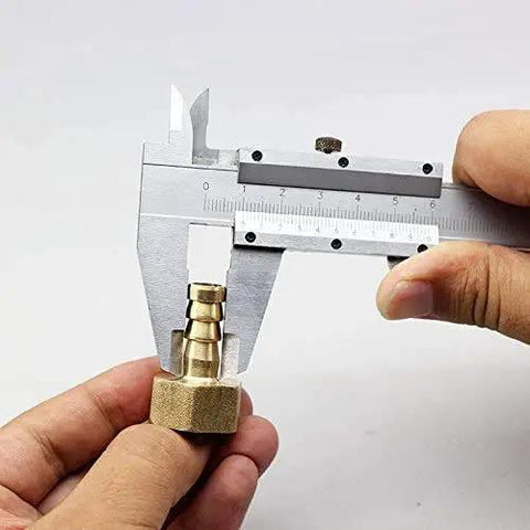 Close-up of a person measuring a brass fitting for the Top Notch DC 12V Solar Hot Water Heater Circulation Pump.