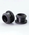 Close-up of 10 piece silicone hole plugs kit for 4.5mm to 50.6mm openings with snap on caps durable gasket end seals weatherproof black silicone rubber