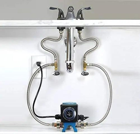 Fully Automatic Instant Hot Water Recirculation Pump For Under Sink Setup With Zero Wait Time And Super Slick Energy Saving Design For Easy Living installed beneath sink with polished faucets and flexible tubing.