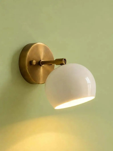 Modern Brass Wall Sconce Light Fixture, Hardwired Wall Lamp in compact size with white shade mounted on green wall.
