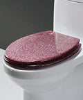 Sparkly Resin Elongated Toilet Seat With No Hassle Quick Release And Smooth Slow Close Lid Easy Tool Free Setup For Modern Bathrooms in glittery finish.