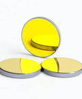 Three 25mm gold-plated laser mirrors with silver rims, set for CO2 laser engraving and cutting