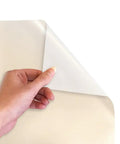 Hand holding a corner of Electric Pearl Heat Transfer Vinyl Roll, 11.8 Inches By 3 Feet, Siser EasyWeed HTV for crafts.