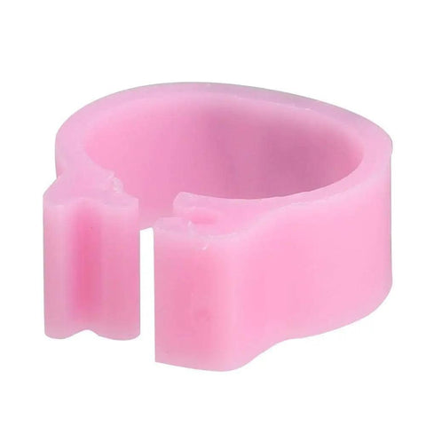 Close-up of a pink 8mm plastic pigeon leg band for bird identification, part of 8mm Plastic Pigeon Leg Bands Rings With Numbers 001 To 100 In A 100 Count Bag Six Color Options For Easy Bird Identification Racing Breeding And Ringing Programs.
