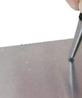 Sick 3 Piece Center Punch Kit Forged From High Carbon Steel With A Hella Secure Non Slip Grip creating a starter hole in metal.