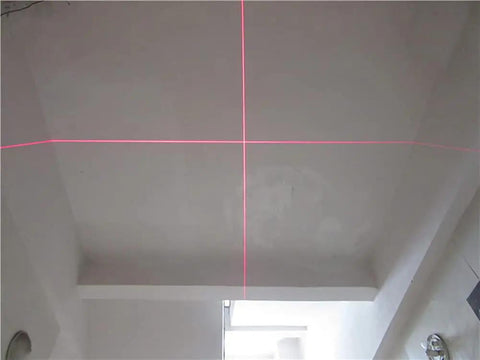 Image showing the 650nm Red Cross Line Module for Indoor Positioning and Crosshair Alignment projecting red cross lines on a ceiling.