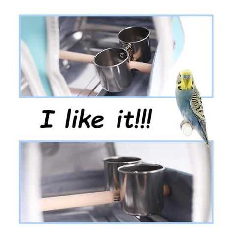Installed view of two stainless steel bird feeder cups with clamp mount on a wooden standing perch inside a bird carrier