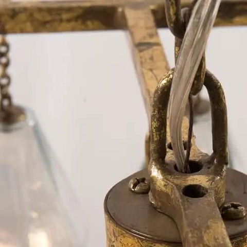 Close-up of the hanging mechanism of the Sleek French Inspired Long Led Chandelier With Prismatic Glass Pendant Lamp.