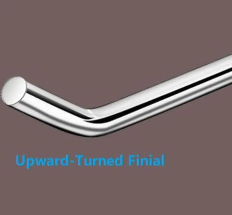 Close-up of chrome upward-turned finial on a curtain rod against a brown background.